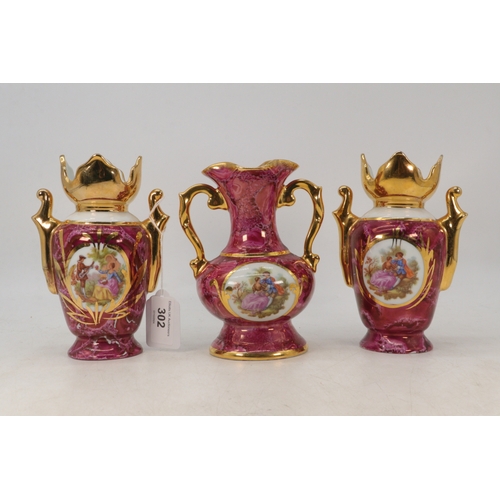 754 - Three Limoges two handled urns