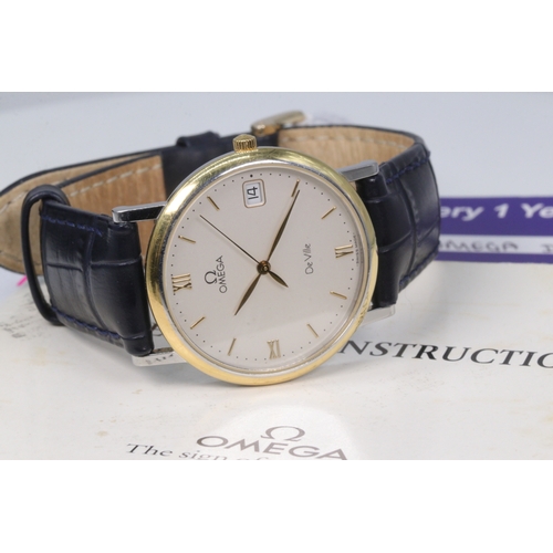 448 - Am Omega De Ville gilt metal cased date adjust wristwatch with leather strap and white dial