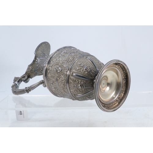 48 - A silver plated Cellini style claret jug