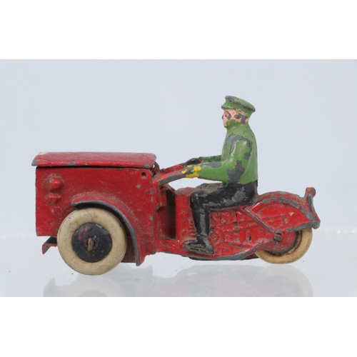 51 - A French Dinky Toys 14Z Triporteur comprising red body with black & green driver, with original hing... 