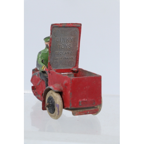 51 - A French Dinky Toys 14Z Triporteur comprising red body with black & green driver, with original hing... 