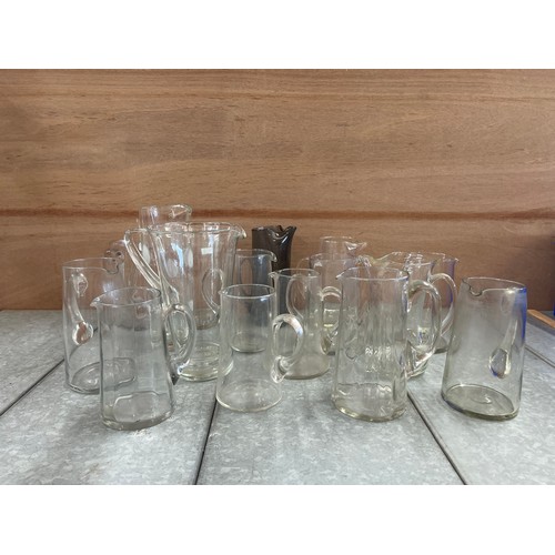 63 - Two cartons of assorted glass water pitchers (16)
