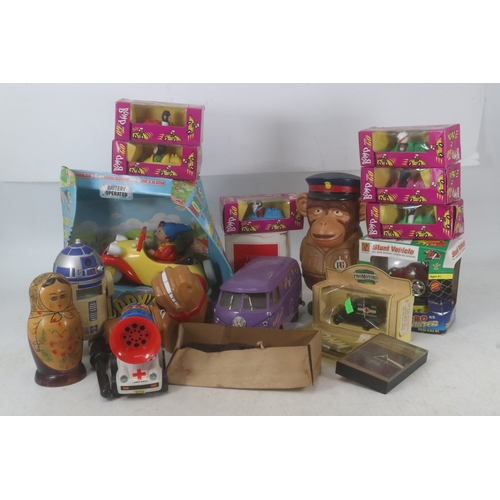 103 - Selection of toys and novelty items together with British Airways headphones, stacking doll, Noddy's... 
