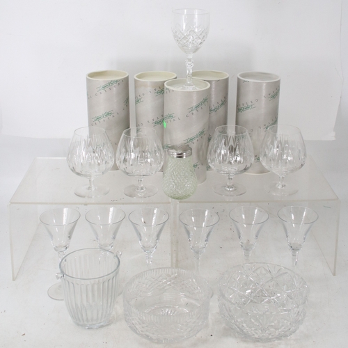 105 - A selection of cut glass drinking goblets, brandy balloons, and other glassware