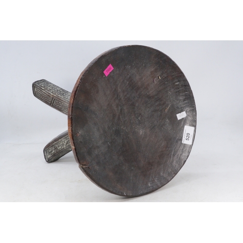 517 - A heavily carved tribal igbo stool