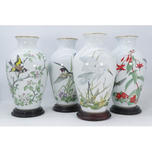 524 - Four boxed Franklin Mint Bird vases to include Woodland Vase, Marshland Vase, Garden Vase and Meadow... 