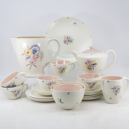 385 - Poole Pottery matching tea ware together with a jug