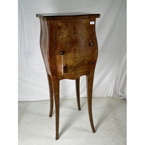 363 - A petite bombe shaped side cupboard with single door and four fitted drawers inside (hinge is a/f)