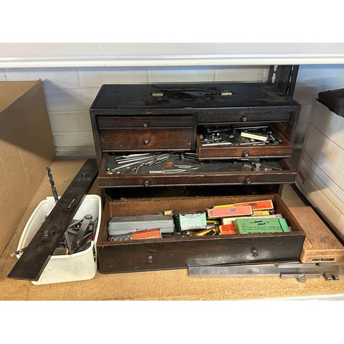 521 - Engineers wooden toolbox in need of repair containing assorted tools, drill bits, etc (large draw fr... 