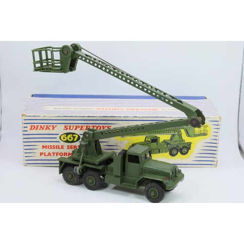 561 - A boxed Dinky super toys 667 Missile servicing platform vehicle