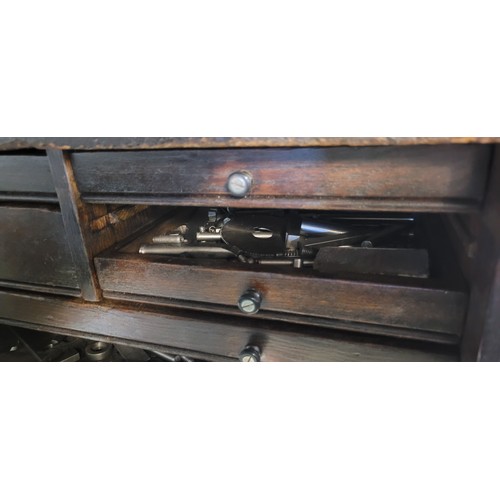 521 - Engineers wooden toolbox in need of repair containing assorted tools, drill bits, etc (large draw fr... 