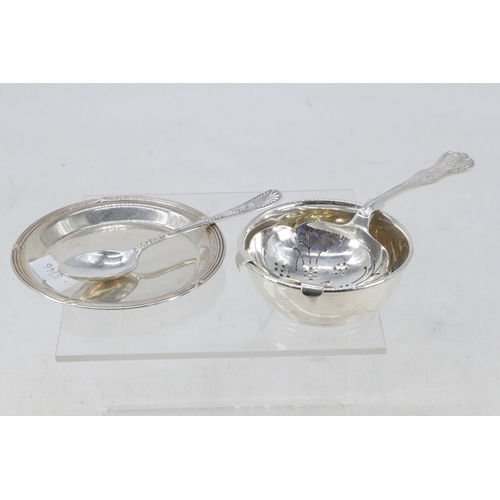 9 - Silver hallmarked tea strainer, with bowl and circular dish. plus one additional spoon. (weight appr... 