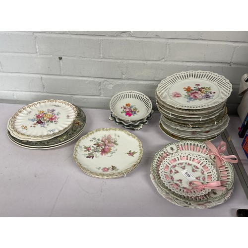 Selection of antique and later ribbon plates and other decorative plates