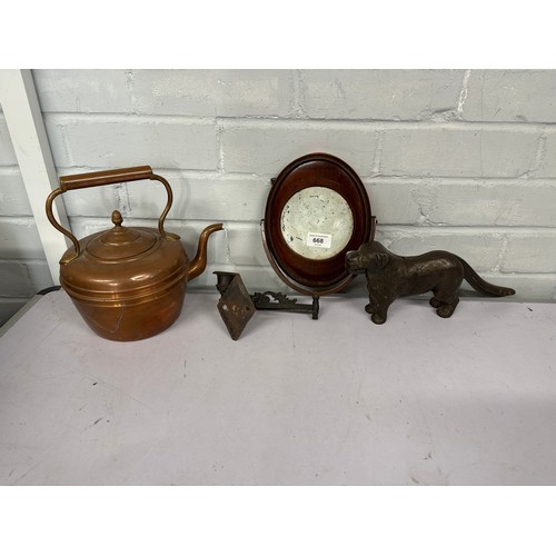 668 - Copper nutcracker in the form of a dog, copper kettle and an antique wall mounted candle and shaving... 