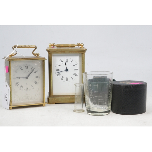 121 - A gilt cased mantle clock with key, an Imhof 8 day carriage clock, and an antique cased measuring cu... 