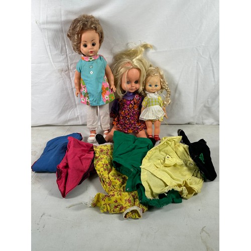 482 - A Tamsad child's folding push-along pram together with sally happy walk and talk doll and two other ... 