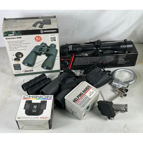 553 - Nikko stirling laser king sight together with boxed Bresser binoculars, tasco pocket binoculars, chi... 