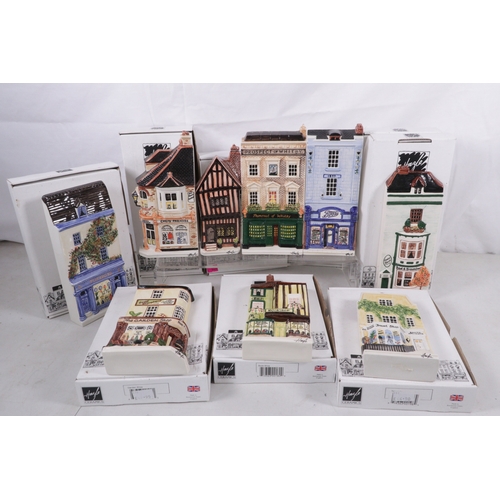 487 - 9 boxed Hazle ceramic shopkeepers ceramic plaques one named Lavenham