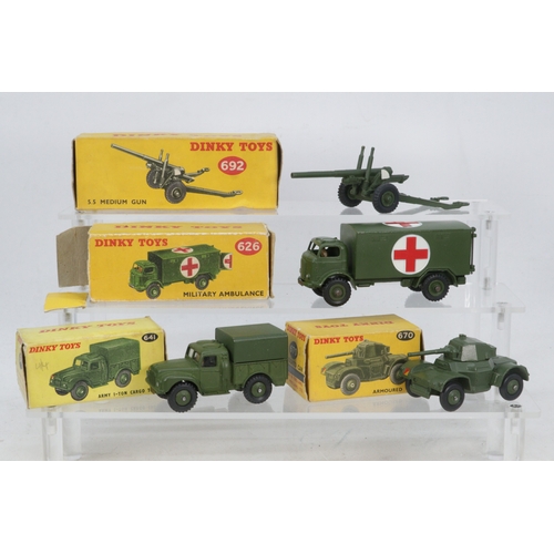 576 - Four boxed Dinky Toys diecast vehicles 626 Military Ambulance, 692 5.5 Medium Gun, 670 Armoured Car ... 