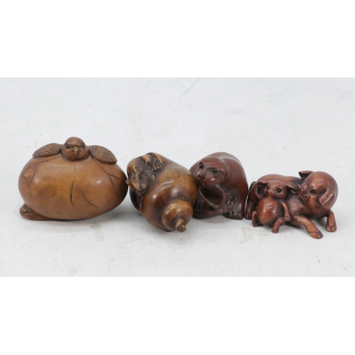 59 - Four wooden carved Netsuke