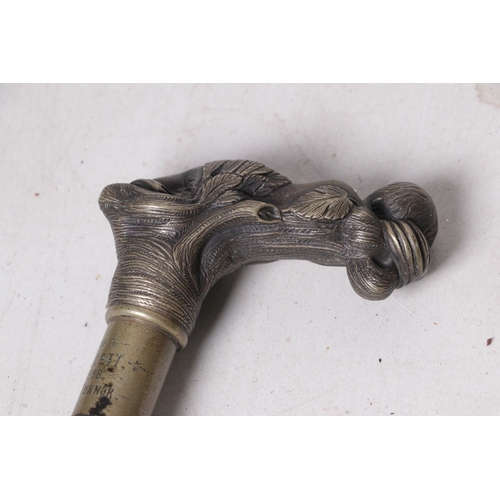 94 - Antique walking cane with bronze cherub style handgrip with presentation inscription collar