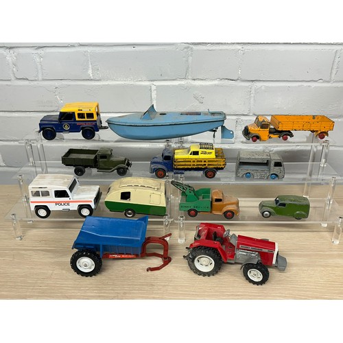 495 - Quantity of loose diecast to include Dinky, ERTL, Britains, Comet etc