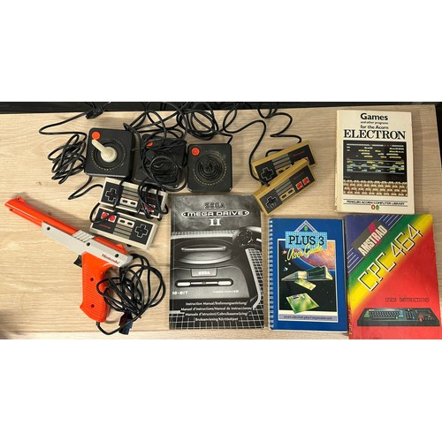 513 - Amstrad CPC 464 and instructions together with an Atari  video computer system, controllers, Sega Me... 