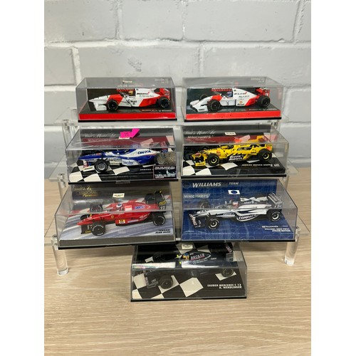 543 - Seven boxed Pauls Model Art Minichamps F1 Vehicles to include Jordan Mugen Honda 198 D. Hill, McClar... 