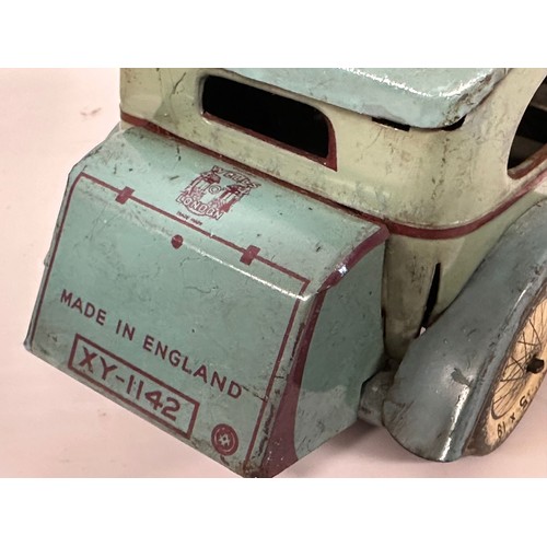 577 - Vintage Wells tinplate saloon car made in England finished in original blue paint with purple detail... 