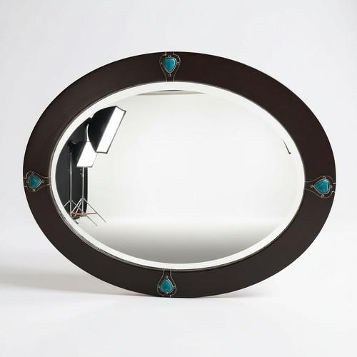 85 - Art Nouveau copper oval mirror set with four Ruskin style stones in the manner of Libertys - measure... 