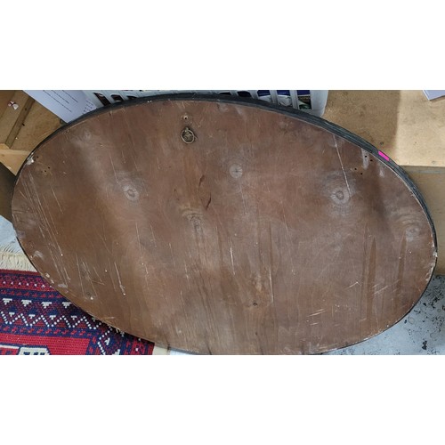 85 - Art Nouveau copper oval mirror set with four Ruskin style stones in the manner of Libertys - measure... 