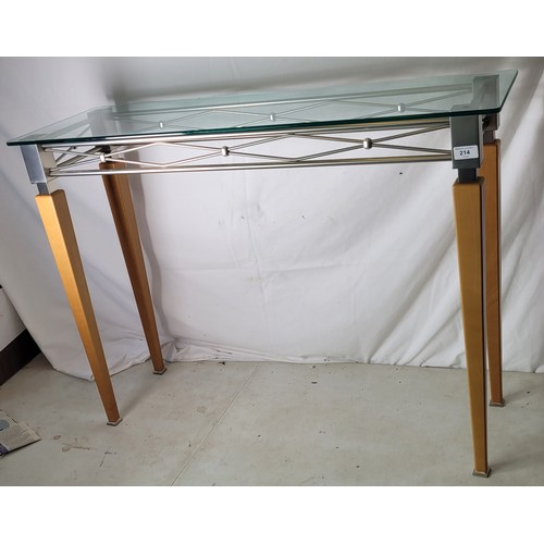 214 - A contemporary beech and metal console table with glass top and matching wall mirror