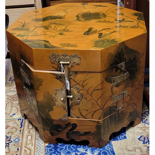 400C - Oriental hexagonal cupboard (lock inside) measures approx. 46cm high x 60cm wide