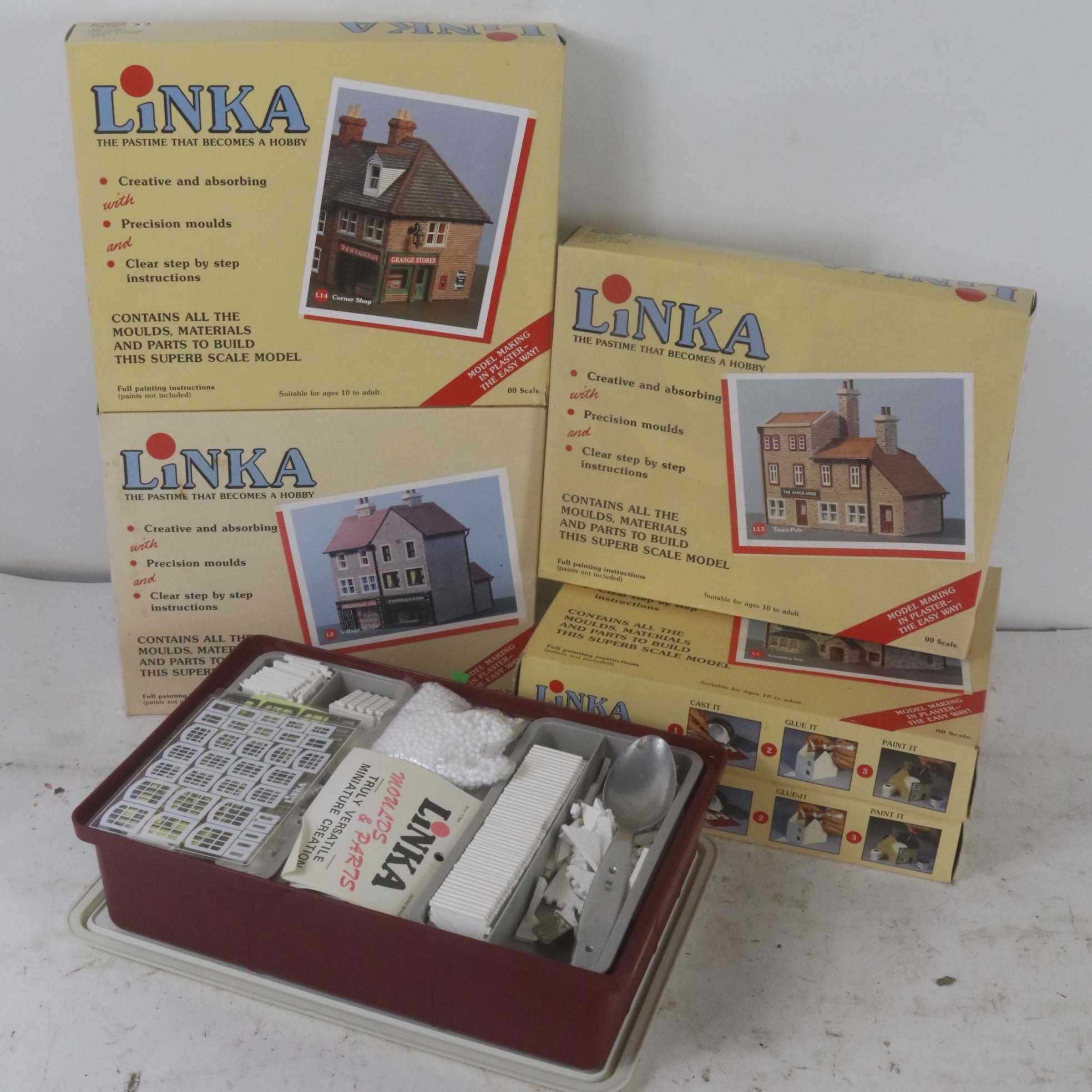 Five boxed Linka model kits together with a box of accessories etc