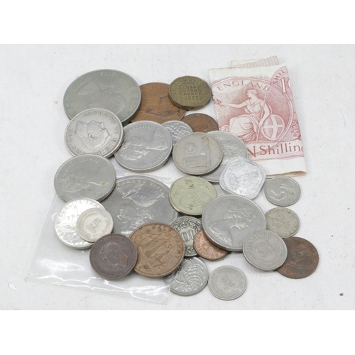 171 - A small tin of coins to include Churchill, 2002 Elizabeth, shilling notes etc