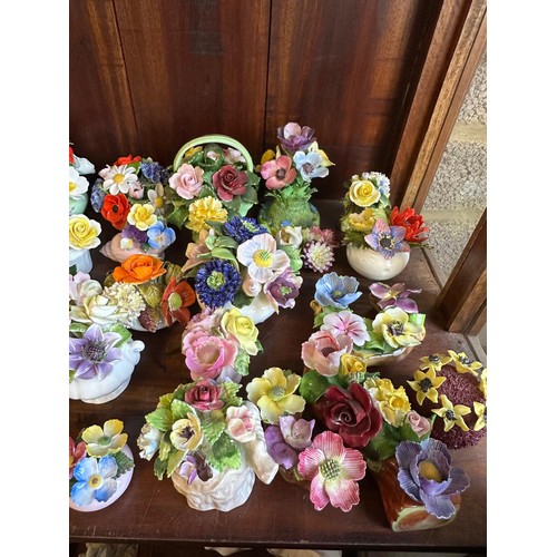 290 - A large quantity of assorted ceramic and porcelain florals including Adderley, Crown Staffordshire, ... 