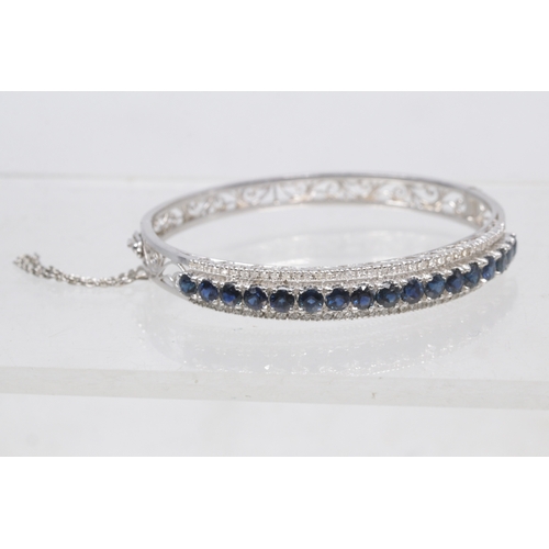 130 - Sapphire, Diamond and white gold bangle