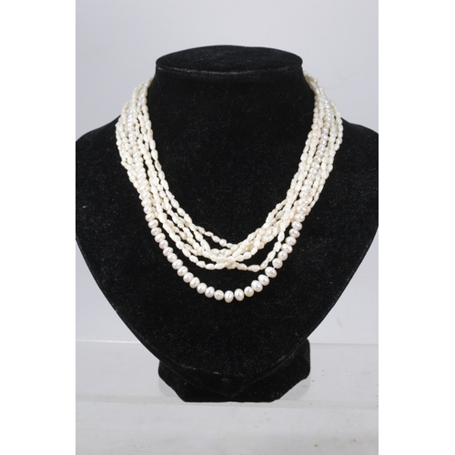 132 - Two rows rice pearls and a pearl necklace