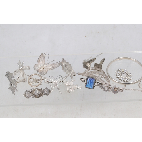 137 - A selection of silver and filigree brooches, Charles Horner bracelet (approx. 49g)