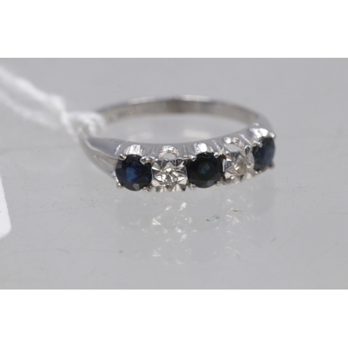 143 - A Sapphire and diamond 5 stone 9ct white gold half eternity band