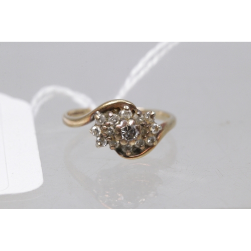 145 - A 9ct gold diamond cluster ring