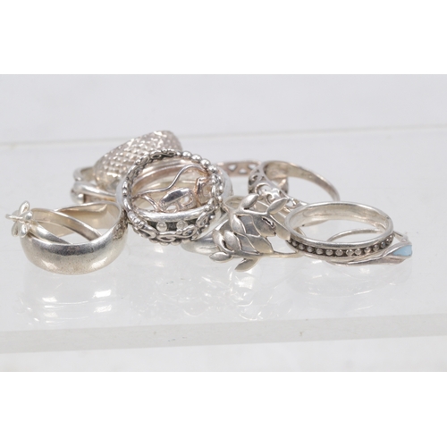 146 - A selection of silver and white metal rings (approx. 35g)