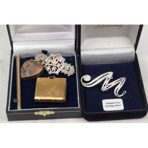 154 - Heart locket set with stones, silver and gold coloured brooch, mechanical pencil and gold plated min... 