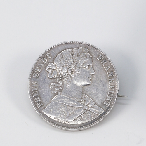 182 - A silver coin brooch