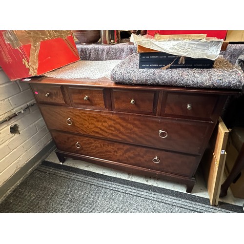 295 - Stag Minstrel chest of drawers fitted four small drawers over two long.