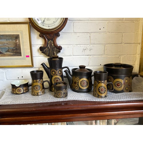 406 - A quantity of Denby Arabesque including teapot, dishes, casserole dish etc