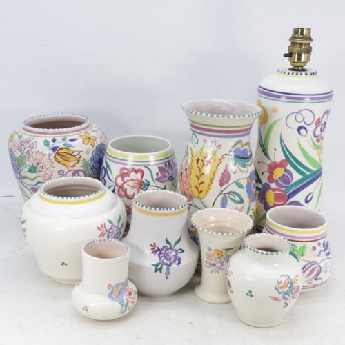 373 - A quantity of Poole Pottery floral decorated vases, lamp base etc