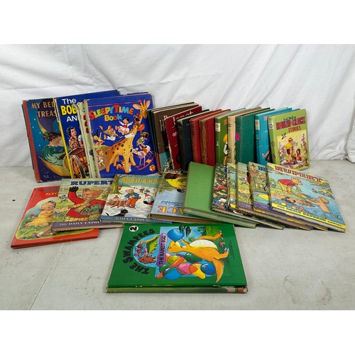 265 - A mixed collection of children’s books and annuals, including Enid Blyton titles, The Bobbsey Twins ... 
