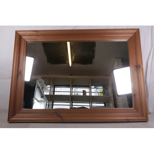 357 - Large pine framed rectangular mirror, measures approx. 66cm x 92cm