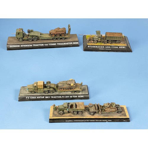 17 - A group of four detailed military transport models, including Seddon Atkinson Trailmaster with armou... 